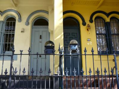 Two yellow and blue terrace houses Australia