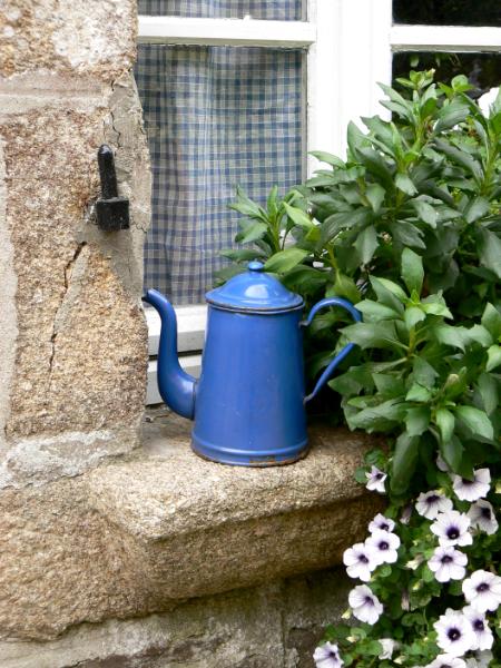 Blue pot on window France