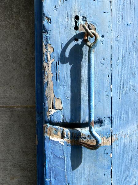 Latch on blue door France